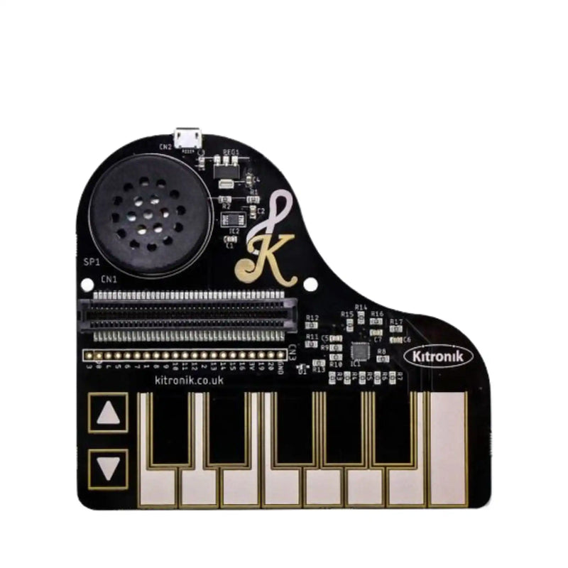 Black piano-shaped circuit board.